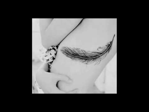 Significado del tatuaje de pluma con aves
