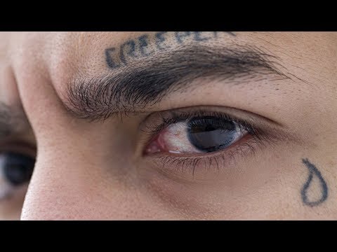 Significado del tatuaje de gota en la cara